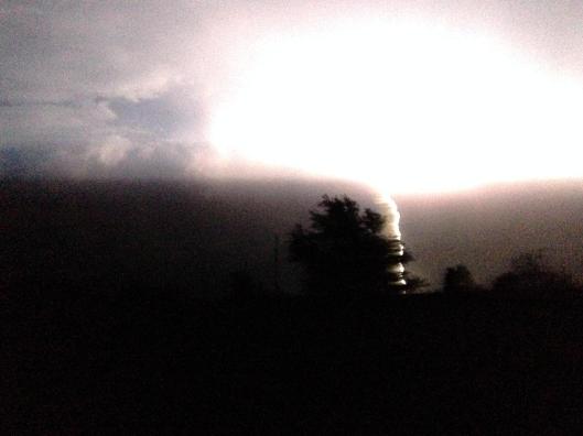 lightning strike at night with a blue sky