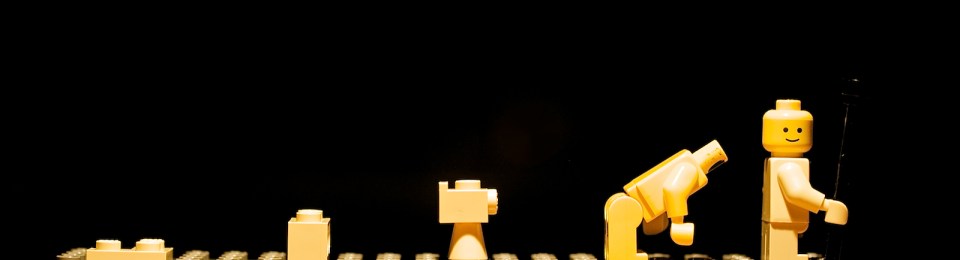 An photo of Lego minifigs depicting human evolution